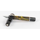 A Delta Gallery fountain pen with swirl decorated coloured body,