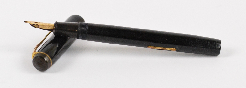 A Conway Stewart no.286 fountain pen with black body and 14ct yellow gold nib, length 12.8cm.