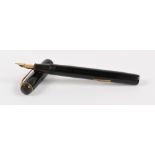 A Conway Stewart no.286 fountain pen with black body and 14ct yellow gold nib, length 12.8cm.