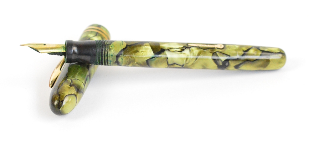 A Conklin fountain pen in moss agate green marbled body and with Nichroma iridium point nib,