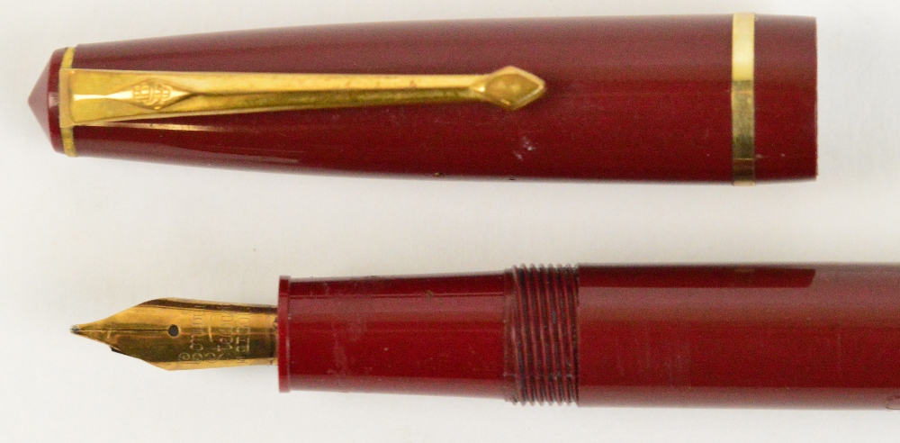 A Conway Stewart "Conway 150" fountain pen with maroon body and 14ct yellow gold nib, length 13.3cm. - Image 3 of 4
