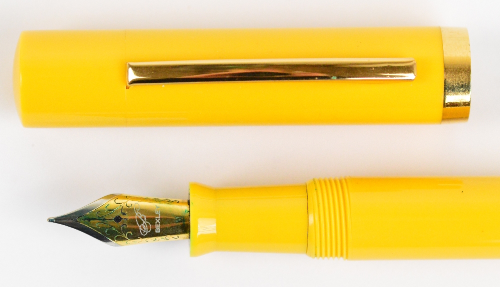 A Bexley fountain pen with mandarin yellow body and plated mounts, length 15.3cm. - Image 3 of 3