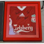 A limited edition signed Liverpool FC home shirt for the 2008-2009 season, signed by Steven Gerrard,