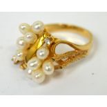 A 14ct gold pearl and diamond dress ring, size M 1/2, approx 6.4g.