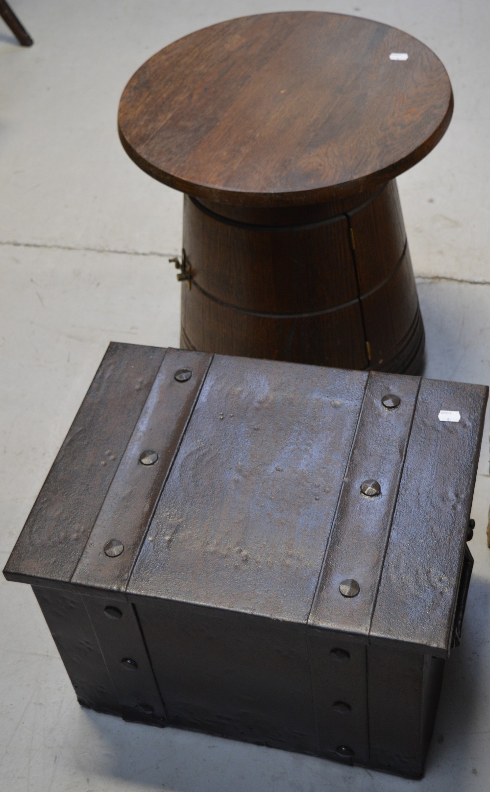 A 1970s oak barrel-shaped drinks cabinet, height 52cm and a twin handled coal bin, width 50cm (2).