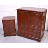 A contemporary small four drawer chest of drawers on bracket feet,