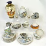 A Japanese baluster vase, an eggshell china tea service and other Oriental ceramics.