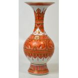 A trumpet neck baluster vase, the bulbous body rising to a tall trumpet neck with wide flaring rim,