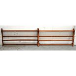 Two retro Ercol plate racks, width of both 97cm.