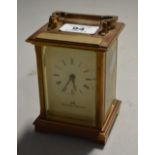 A 20th century Matthew Norman brass carriage clock, height 11cm.