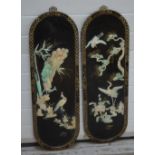 A pair of 20th century oval Oriental panels with applied mother of pearl decoration of birds