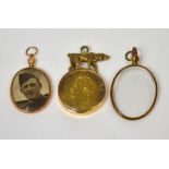 A yellow metal framed gold coin dated 1826 and two yellow metal framed portrait pendants,