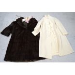 A vintage ladies' beaver lamb coat and a vintage ladies' cream coat (2).