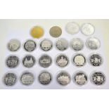 A cased collection of twenty-one silver commemorative coins including the Liverpool 800th