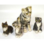 Four Winstanley pottery models of cats, largest 25cm (4).