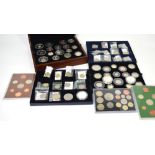 A quantity of boxed commemorative coins, Royal Mint including 2014 premium proof coin set.