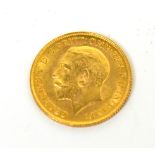 A boxed George V 1926 half sovereign, with certificate of authenticity.