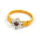 A 9ct yellow gold floral set dress ring, size L, approx 1.8g.