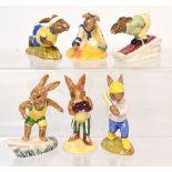 Six Royal Doulton 'Bunnykins' figures DB133 'Aussie Surfer Bunnykins', DB31 'Downhill Bunnykins',