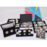 A quantity of commemorative coins predominately Royal Mint boxed examples including a boxed set of