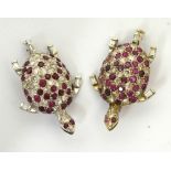 A pair of white metal brooches in the form of turtles set with diamonds and rubies,