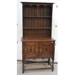 An early to mid 20th century slim oak dresser,