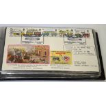 A black first day cover album containing a quantity of first day covers to include examples