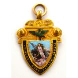 A rare Edwardian 9ct gold and enamel decorated football medal for the Zingari League,