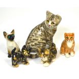 Five Winstanley pottery models of cats, largest 24cm (5).