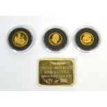 A cased set of three commemorative gold coins; quarter guinea, quarter sovereign and five pounds,