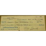 A framed and glazed cheque made payable to Francis Orr Stationery Co for $8.