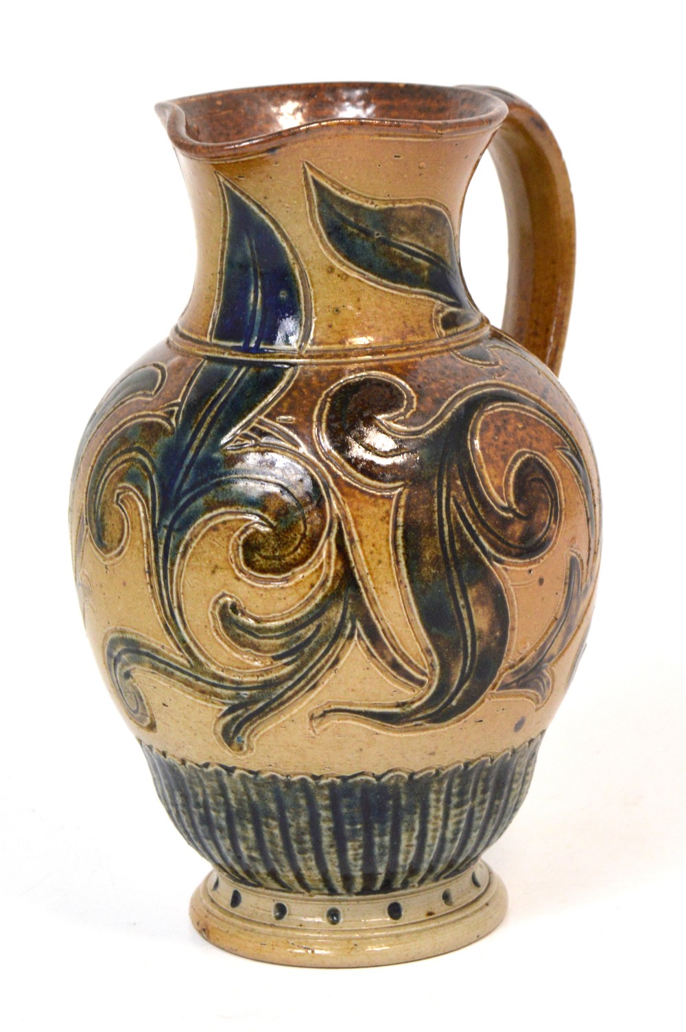 Arthur Barlow for Doulton Lambeth; a stoneware pitcher with stylised floral sgraffito decoration,