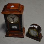 A thirty hour mantel clock, the silvered dial set with Arabic numerals,