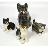 Four Winstanley pottery models of cats, largest 23cm (4).