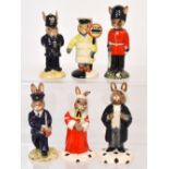 Six Royal Doulton 'Bunnykins' figures DB214 'Lawyer Bunnykins', DB127 'Guardsman Bunnykins',