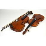 A full size cased Stradivarius copy violin, length 37cm, a 3/4 size violin, length 35cm,