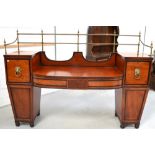 A Regency mahogany drop-centre sideboard with raised turned brass gallery, width 214cm.