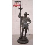 A freestanding spelter gas lamp in the form of a cavalier,