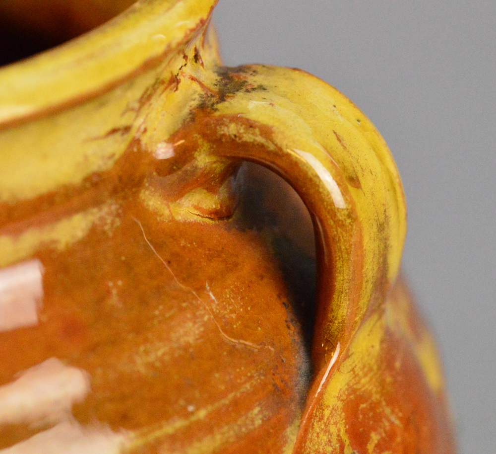 Winchcombe Pottery: an early slipware vase with three lug handles covered in a rich treacle yellow - Image 3 of 8