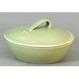 Leach Pottery; a porcelain dish and cover, green celadon glaze, impressed pottery mark,