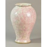 REGINALD FAIRFAX WELLS (1877-1951); a large stoneware baluster vase covered in mottled pink glaze,