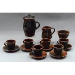 Leach Pottery; a stoneware coffee set comprising coffee pot, milk jug,