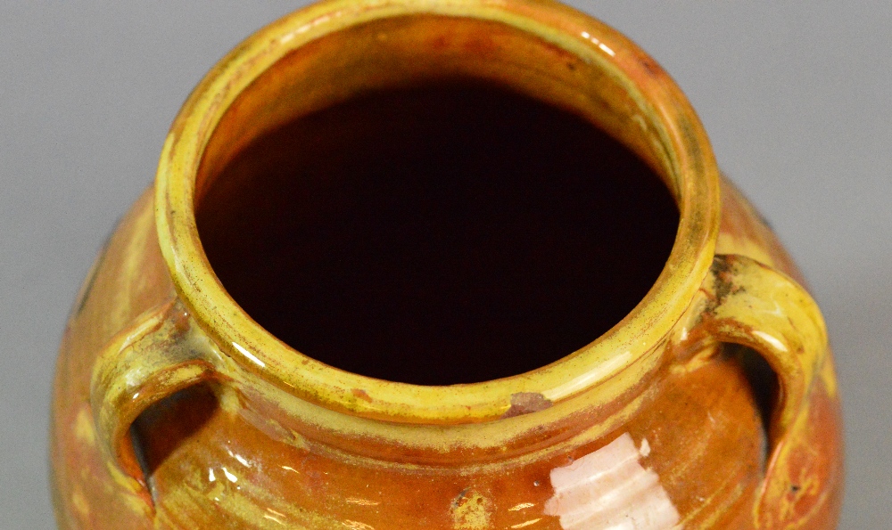 Winchcombe Pottery: an early slipware vase with three lug handles covered in a rich treacle yellow - Image 2 of 8