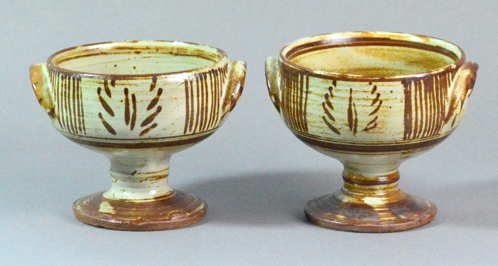 MICHAEL CARDEW (1901-1983) for Wenford Bridge Pottery; a near pair of stoneware chalices,