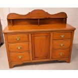 An Edwardian walnut sideboard,