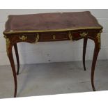 A reproduction mahogany shaped and brass inlay side table with three drawers on cabriole legs and