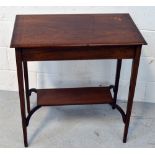 An Edwardian mahogany inlaid hall table with lower shelf on tapering supports, length 66cm.