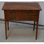 A Victorian walnut two-drawer side table, the drawers with brass ring handles,