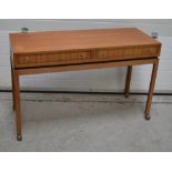 A retro two-drawer console table on castors, width 118cm.