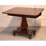 A Victorian mahogany tea table with central bulbous column support above quadripartite base to